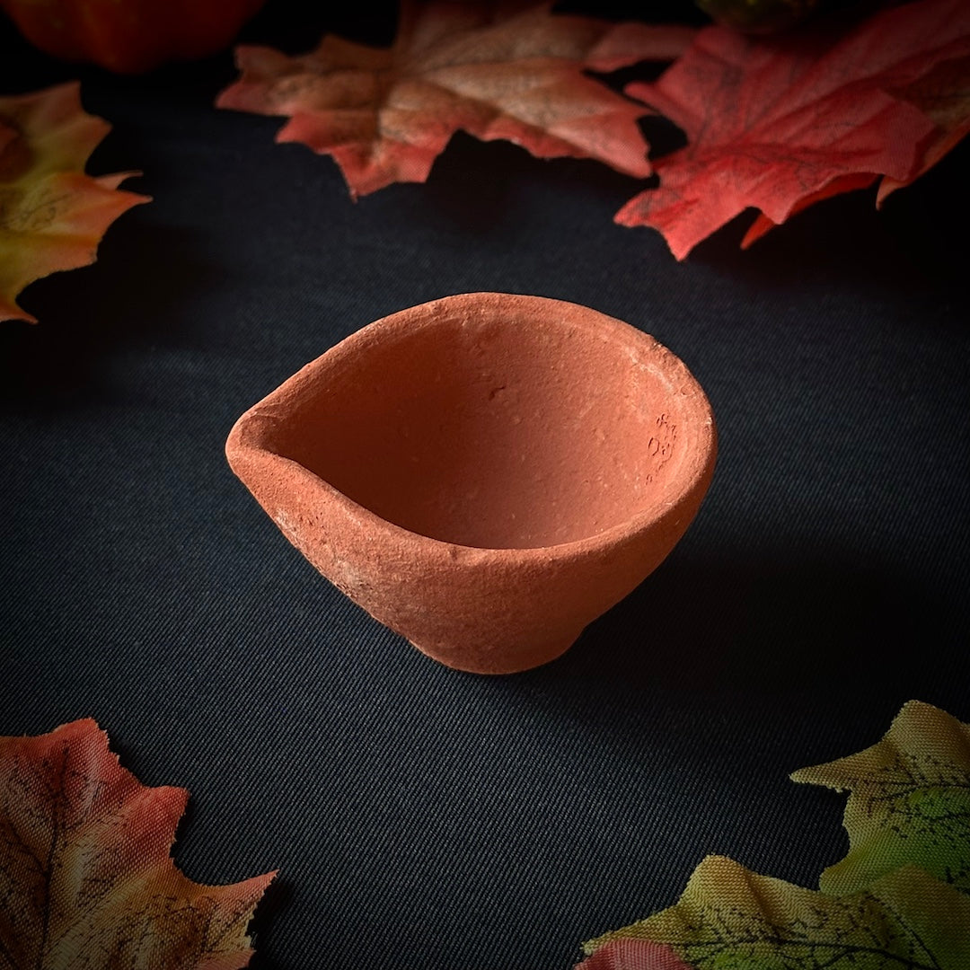 Clay Lamp and Candle