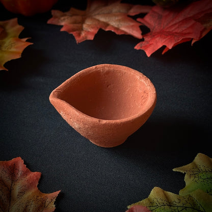 Clay Lamp and Candle