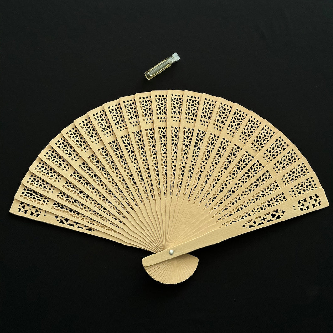 Wooden Fan and Essential Oil