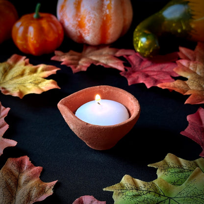 Clay Lamp and Candle