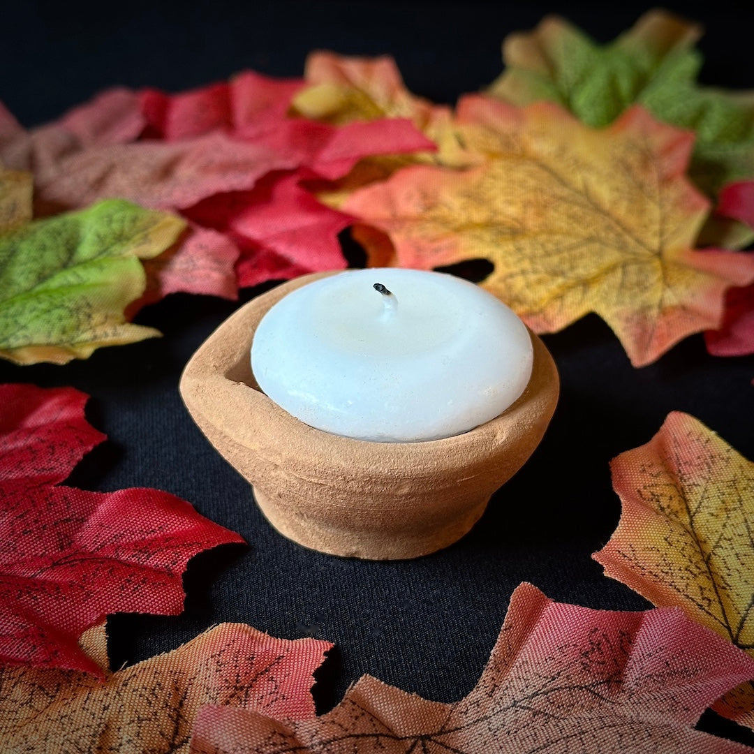 Clay Lamp and Candle