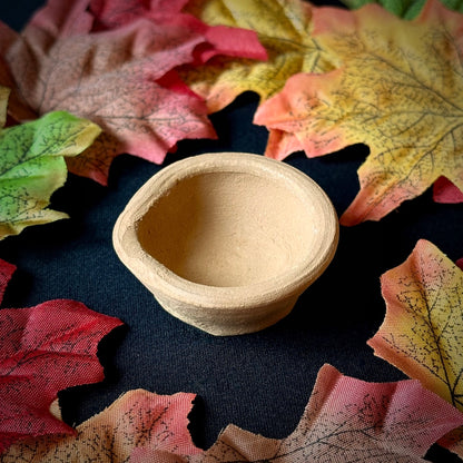 Clay Lamp and Candle